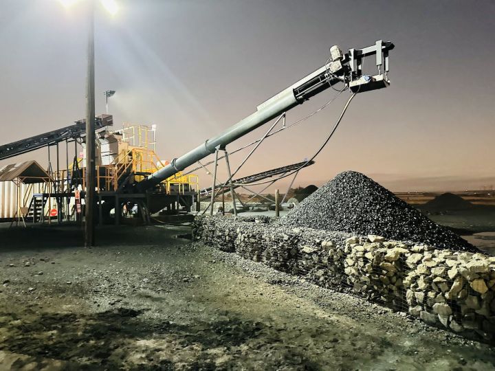 G8 wash plant running at night, conveyor building the product stockpile